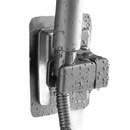 Chrome shower head holder with water droplets.