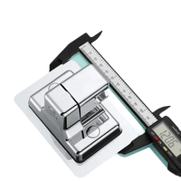 Chrome-plated toilet partition latch with digital caliper.