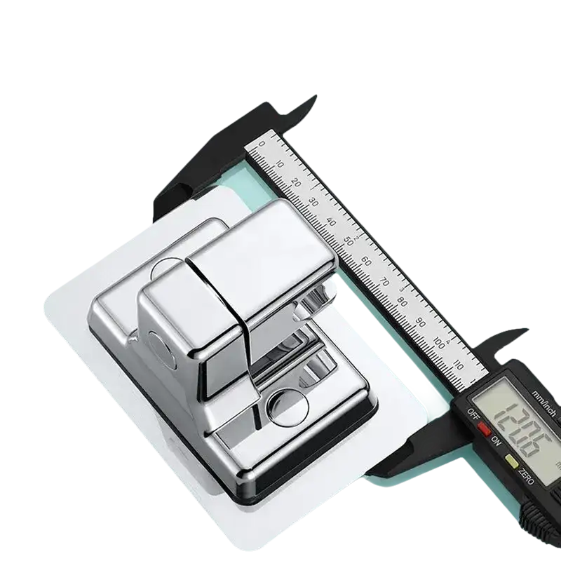 Chrome-plated toilet partition latch with digital caliper.