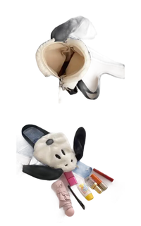 Fuzzy black and white bunny purse.