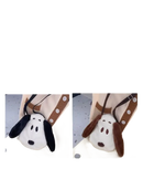 Plush Snoopy-shaped bag with product information.