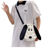 Plush Snoopy crossbody bag.