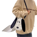 Plush Snoopy purse with black strap.