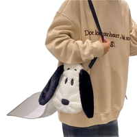 Plush Snoopy purse with black strap.