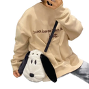 Snoopy-shaped plush purse.