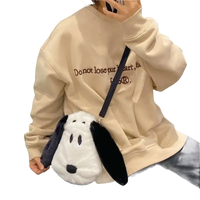 Snoopy-shaped plush purse.