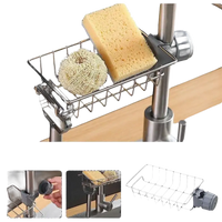 Faucet-mounted sponge holder.
