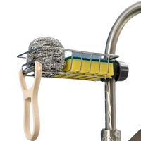 Faucet sponge holder with cleaning supplies.
