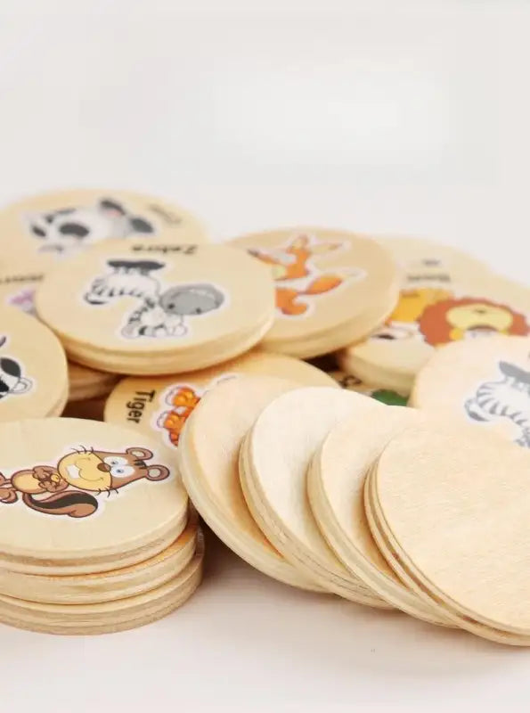 Wooden animal matching game pieces.
