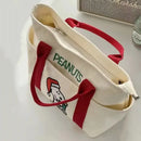 Canvas tote bag with Snoopy design.
