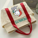 Canvas tote bag with Snoopy design.