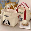 Two canvas tote bags with Snoopy designs.