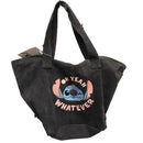 Black tote bag with Stitch graphic.