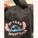 Gray tote bag with Stitch graphic.