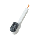 White cleaning brush with gray bristles.