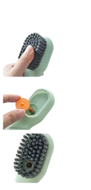 Green cleaning brush with liquid dispenser.