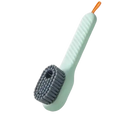 Light green cleaning brush with gray bristles.