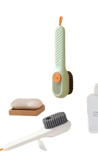 Multifunctional shoe brush with liquid dispenser.