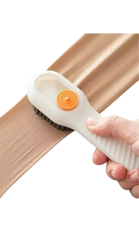 Soft bristle clothing brush.