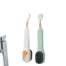 Two hanging cleaning brushes.