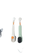 Two handled cleaning brushes.