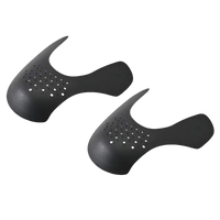 Black shoe shields with ventilation holes.