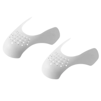 White perforated shoe shields.