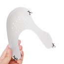 Shoe shield inserts with cut lines.