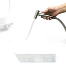 Handheld bidet sprayer.