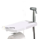 Stainless steel bidet sprayer with shelf.