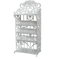 White ornate four-shelf rack.