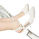 White leather pointed-toe heels.