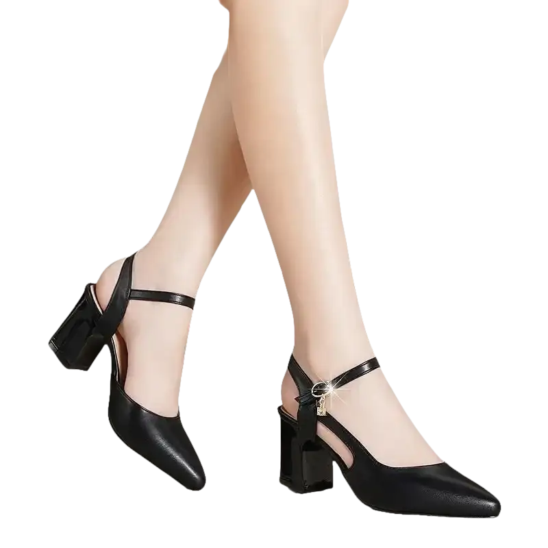 Black leather ankle strap heels.