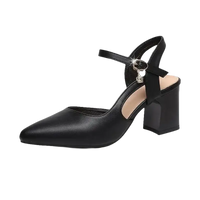 Black leather heeled shoe with ankle strap.
