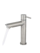 Brushed metal bathroom faucet with running water.