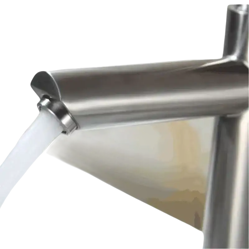 Brushed metal faucet with running water.