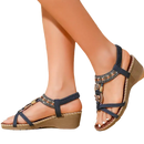 Women’s wedge sandals with beaded details.