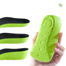 Green shoe inserts with varying thicknesses.