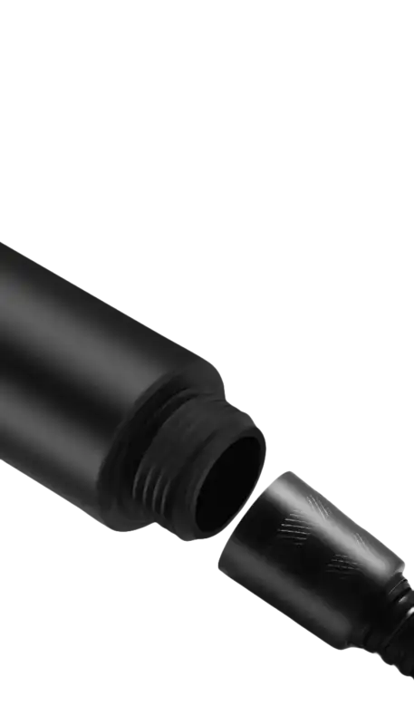 Black bottle with detachable nozzle.