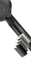 Black shower head with multiple paint layers.