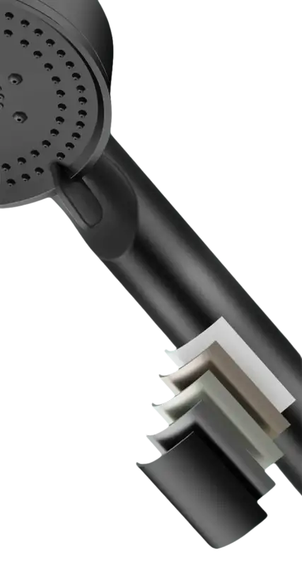 Black shower head with multiple paint layers.