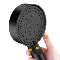 Black shower head with multiple spray settings.