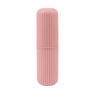 Pink ribbed toothbrush holder with strap from Vertibrush Travel Kit for travel-friendly brushing
