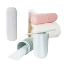 Pastel toothbrush and toothpaste containers in Vertibrush Travel Kit for on-the-go freshening