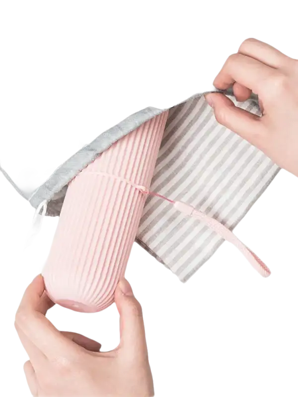 Pink ribbed travel container from Vertibrush Travel Kit with trendy vertibrush detangling hairbrush