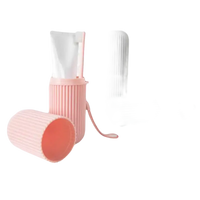 Portable toothbrush and toothpaste containers from Vertibrush Travel Kit for on-the-go freshness