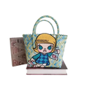 Woven handbag with cartoon girl patch.