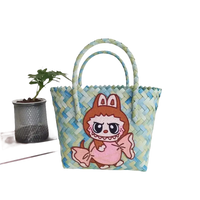 Woven tote bag with cartoon character.
