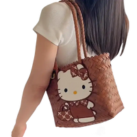 Woven brown Hello Kitty tote bag.