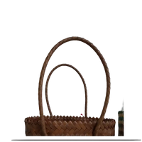 Handwoven brown bag with braided handles.